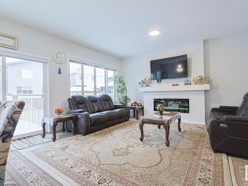 15824 30 Avenue Sw, Edmonton, AB - Indoor Photo Showing Living Room With Fireplace