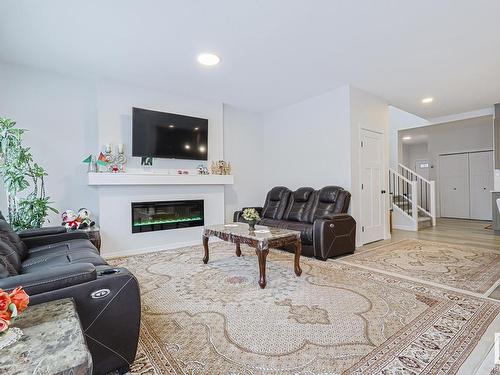 15824 30 Avenue Sw, Edmonton, AB - Indoor Photo Showing Living Room With Fireplace