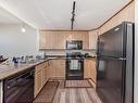 409 6315 135 Avenue, Edmonton, AB  - Indoor Photo Showing Kitchen With Double Sink 