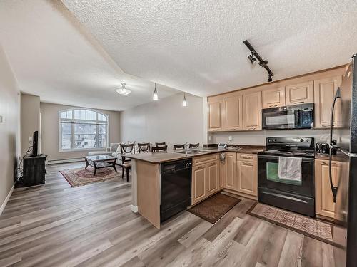 409 6315 135 Avenue, Edmonton, AB - Indoor Photo Showing Kitchen With Double Sink