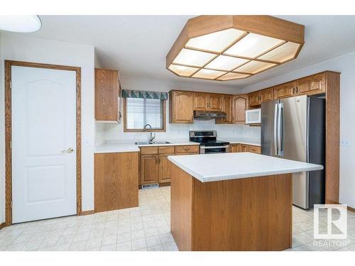 15711 67 Street, Edmonton, AB - Indoor Photo Showing Kitchen With Double Sink