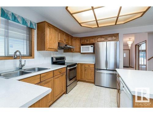 15711 67 Street, Edmonton, AB - Indoor Photo Showing Kitchen With Stainless Steel Kitchen With Double Sink