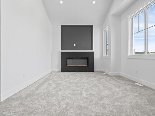 4743 Alwood Bend Bend, Edmonton, AB - Indoor With Fireplace