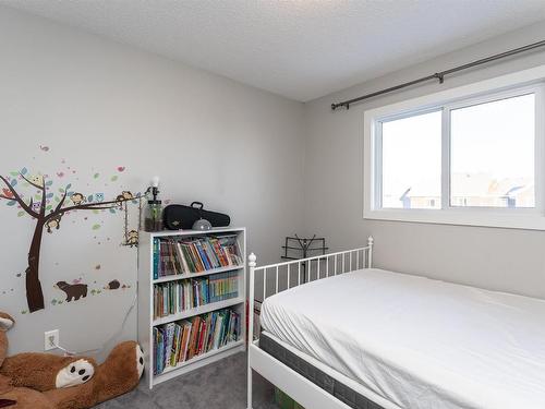 16712 15 Avenue, Edmonton, AB - Indoor Photo Showing Bedroom