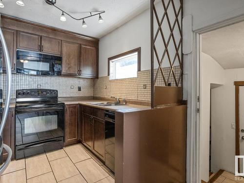 14327 103 Avenue Nw, Edmonton, AB - Indoor Photo Showing Kitchen With Double Sink