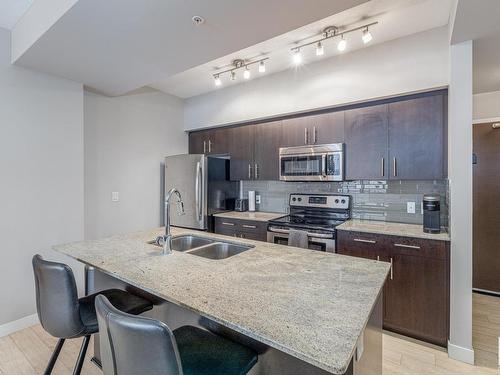 2203 10226 104 Street, Edmonton, AB - Indoor Photo Showing Kitchen With Stainless Steel Kitchen With Double Sink With Upgraded Kitchen