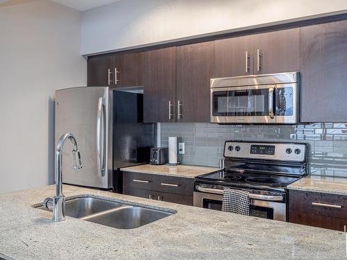 2203 10226 104 Street, Edmonton, AB - Indoor Photo Showing Kitchen With Stainless Steel Kitchen With Double Sink With Upgraded Kitchen