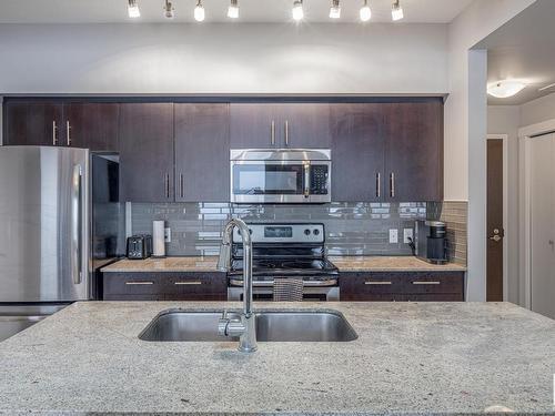 2203 10226 104 Street, Edmonton, AB - Indoor Photo Showing Kitchen With Stainless Steel Kitchen With Double Sink With Upgraded Kitchen