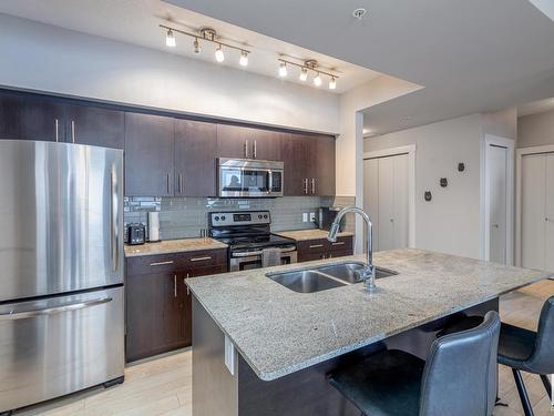 2203 10226 104 Street, Edmonton, AB - Indoor Photo Showing Kitchen With Stainless Steel Kitchen With Double Sink With Upgraded Kitchen