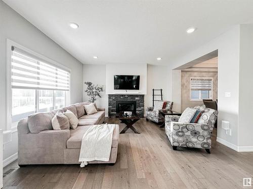 6516 Elston Loop, Edmonton, AB - Indoor Photo Showing Living Room With Fireplace