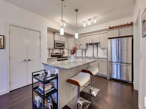 111 10523 123 Street, Edmonton, AB - Indoor Photo Showing Kitchen With Stainless Steel Kitchen With Upgraded Kitchen