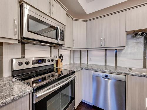 111 10523 123 Street, Edmonton, AB - Indoor Photo Showing Kitchen With Stainless Steel Kitchen