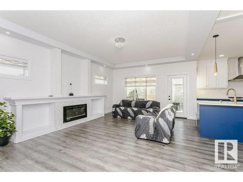 9316 206 Nw, Edmonton, AB - Indoor With Fireplace