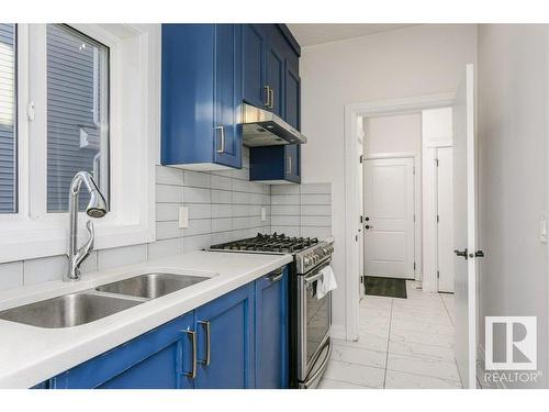 9316 206 Nw, Edmonton, AB - Indoor Photo Showing Kitchen With Double Sink With Upgraded Kitchen