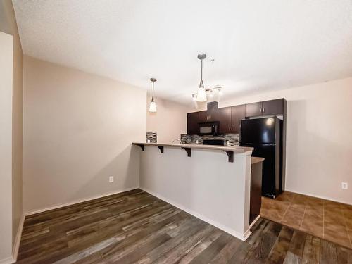 328 1180 Hyndman Road, Edmonton, AB - Indoor Photo Showing Kitchen