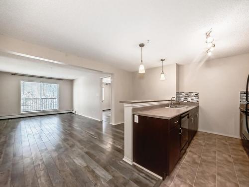 328 1180 Hyndman Road, Edmonton, AB - Indoor Photo Showing Kitchen