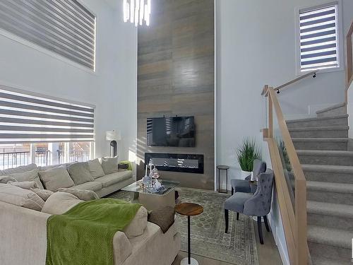 15004 15 Street Nw, Edmonton, AB - Indoor Photo Showing Living Room With Fireplace