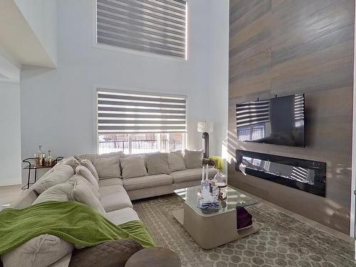 15004 15 Street Nw, Edmonton, AB - Indoor Photo Showing Living Room With Fireplace