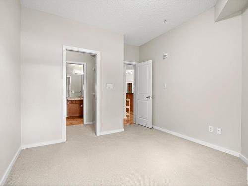 106 9910 111 Street Nw, Edmonton, AB - Indoor Photo Showing Other Room