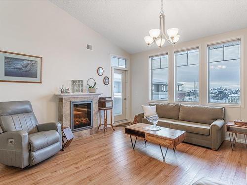 403 4450 Mccrae Avenue, Edmonton, AB - Indoor Photo Showing Living Room With Fireplace