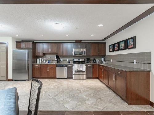 403 4450 Mccrae Avenue, Edmonton, AB - Indoor Photo Showing Kitchen With Double Sink