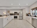 9211 98 Ave, Edmonton, AB  - Indoor Photo Showing Kitchen With Double Sink 