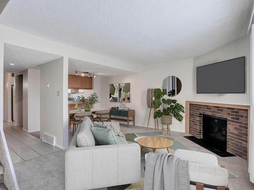 16519 100 Street, Edmonton, AB - Indoor Photo Showing Living Room With Fireplace