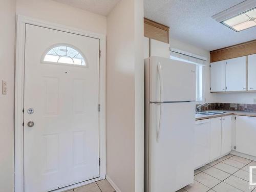 16519 100 Street, Edmonton, AB - Indoor Photo Showing Kitchen With Double Sink