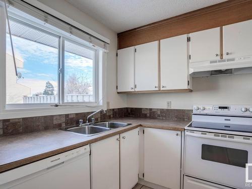 16519 100 Street, Edmonton, AB - Indoor Photo Showing Kitchen With Double Sink