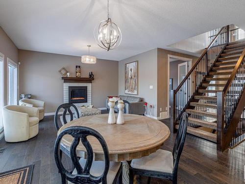 3704 Kidd Crescent, Edmonton, AB - Indoor Photo Showing Dining Room With Fireplace