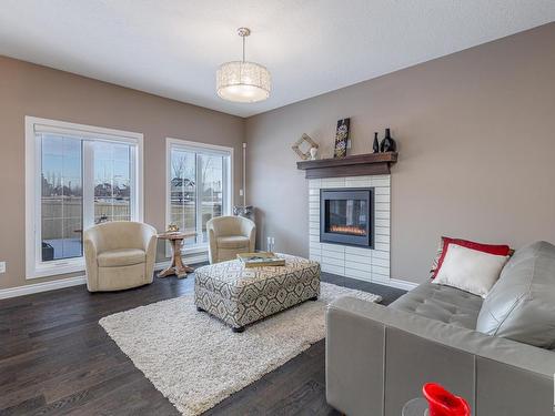 3704 Kidd Crescent, Edmonton, AB - Indoor Photo Showing Living Room With Fireplace