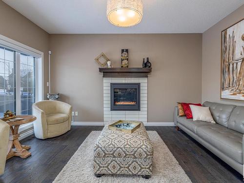 3704 Kidd Crescent, Edmonton, AB - Indoor Photo Showing Living Room With Fireplace