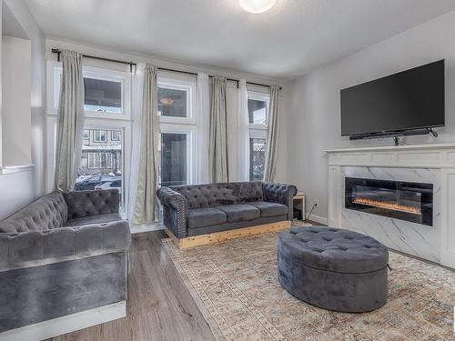 22353 93A Avenue, Edmonton, AB - Indoor Photo Showing Living Room With Fireplace