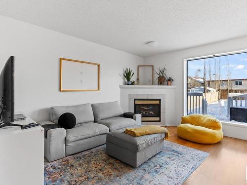 16213 93 Street, Edmonton, AB - Indoor Photo Showing Living Room With Fireplace