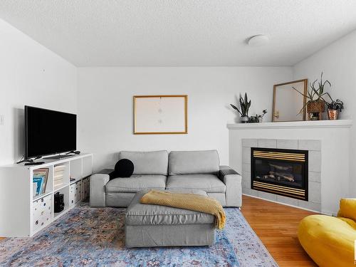 16213 93 Street, Edmonton, AB - Indoor Photo Showing Living Room With Fireplace