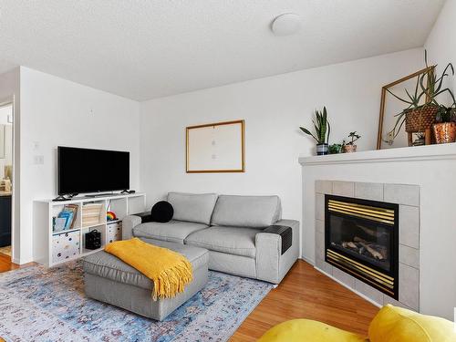 16213 93 Street, Edmonton, AB - Indoor Photo Showing Living Room With Fireplace