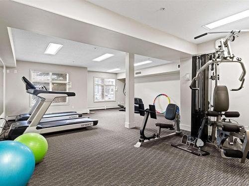 467 11517 Ellerslie Road, Edmonton, AB - Indoor Photo Showing Gym Room