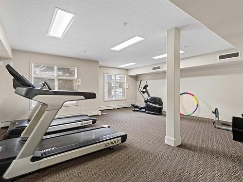 467 11517 Ellerslie Road, Edmonton, AB - Indoor Photo Showing Gym Room