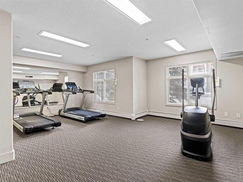 467 11517 Ellerslie Road, Edmonton, AB - Indoor Photo Showing Gym Room