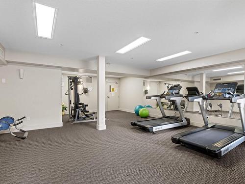 467 11517 Ellerslie Road, Edmonton, AB - Indoor Photo Showing Gym Room