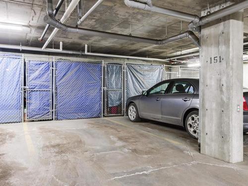 467 11517 Ellerslie Road, Edmonton, AB - Indoor Photo Showing Garage