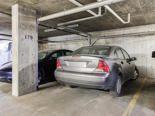 467 11517 Ellerslie Road, Edmonton, AB - Indoor Photo Showing Garage