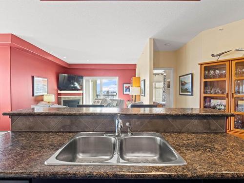 467 11517 Ellerslie Road, Edmonton, AB - Indoor Photo Showing Kitchen With Double Sink