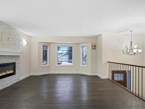 1207 54 Street, Edmonton, AB - Indoor Photo Showing Living Room With Fireplace