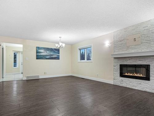 1207 54 Street, Edmonton, AB - Indoor Photo Showing Living Room With Fireplace