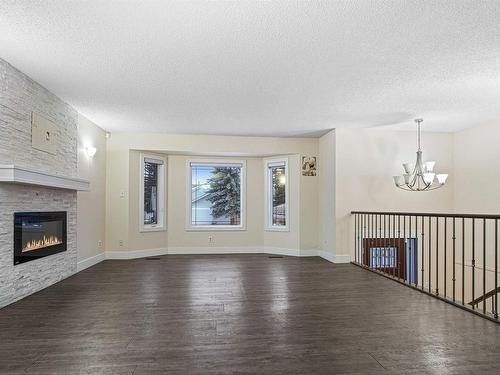 1207 54 Street, Edmonton, AB - Indoor Photo Showing Living Room With Fireplace