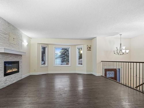 1207 54 Street, Edmonton, AB - Indoor Photo Showing Living Room With Fireplace