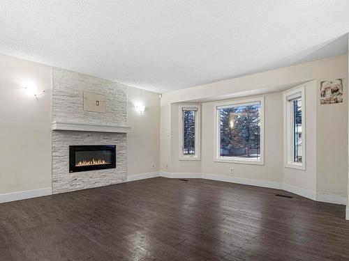 1207 54 Street, Edmonton, AB - Indoor Photo Showing Living Room With Fireplace