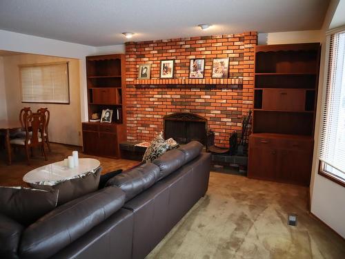 10611 129 Street, Edmonton, AB - Indoor Photo Showing Living Room With Fireplace