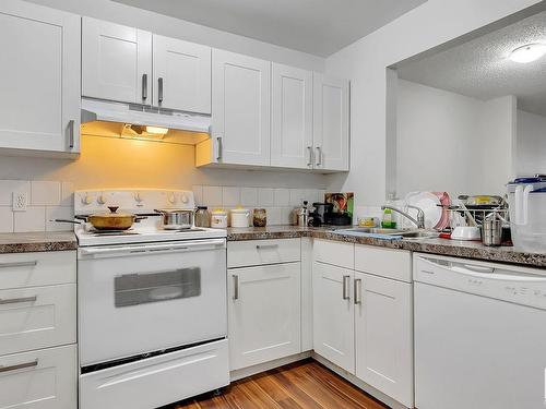 406 14816 26 Street, Edmonton, AB - Indoor Photo Showing Kitchen With Double Sink